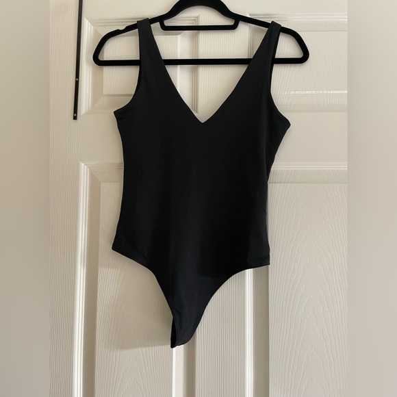 Double Plunging bodysuit. - Picture 3 of 4